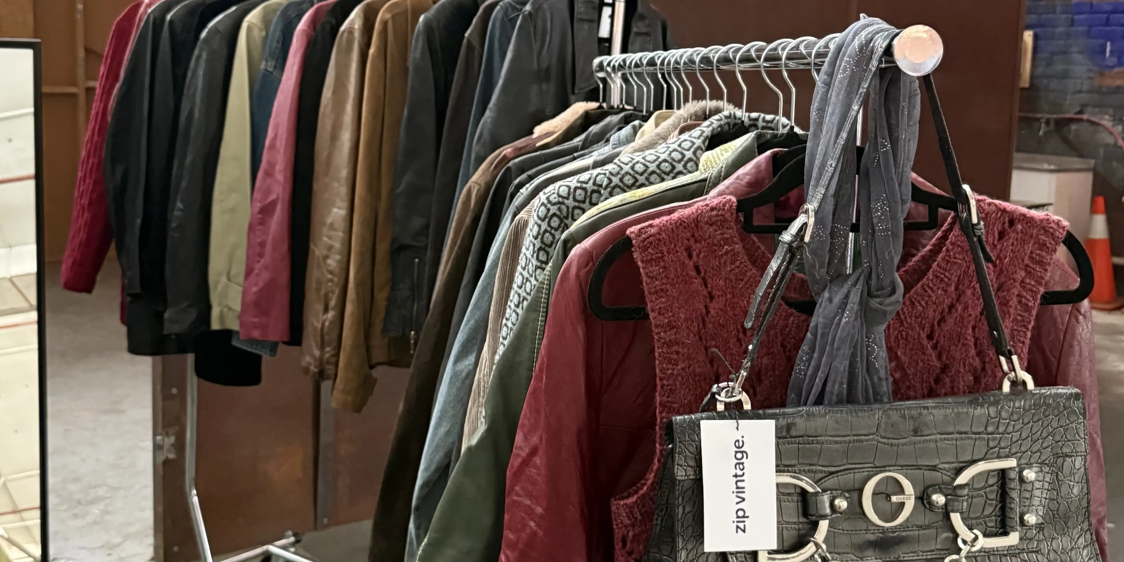 Vintage scarf hanging on a rack of clothes