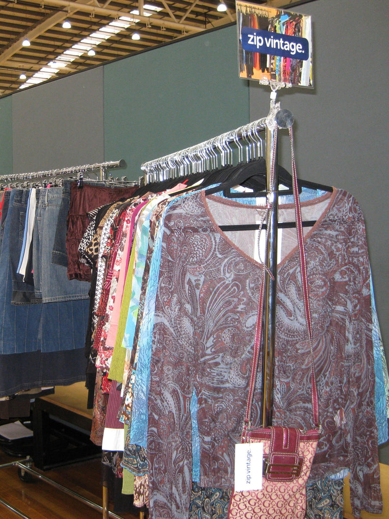Vintage mesh tops hanging on a rack