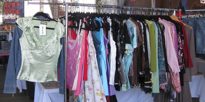 Vintage blouses hanging on a rack