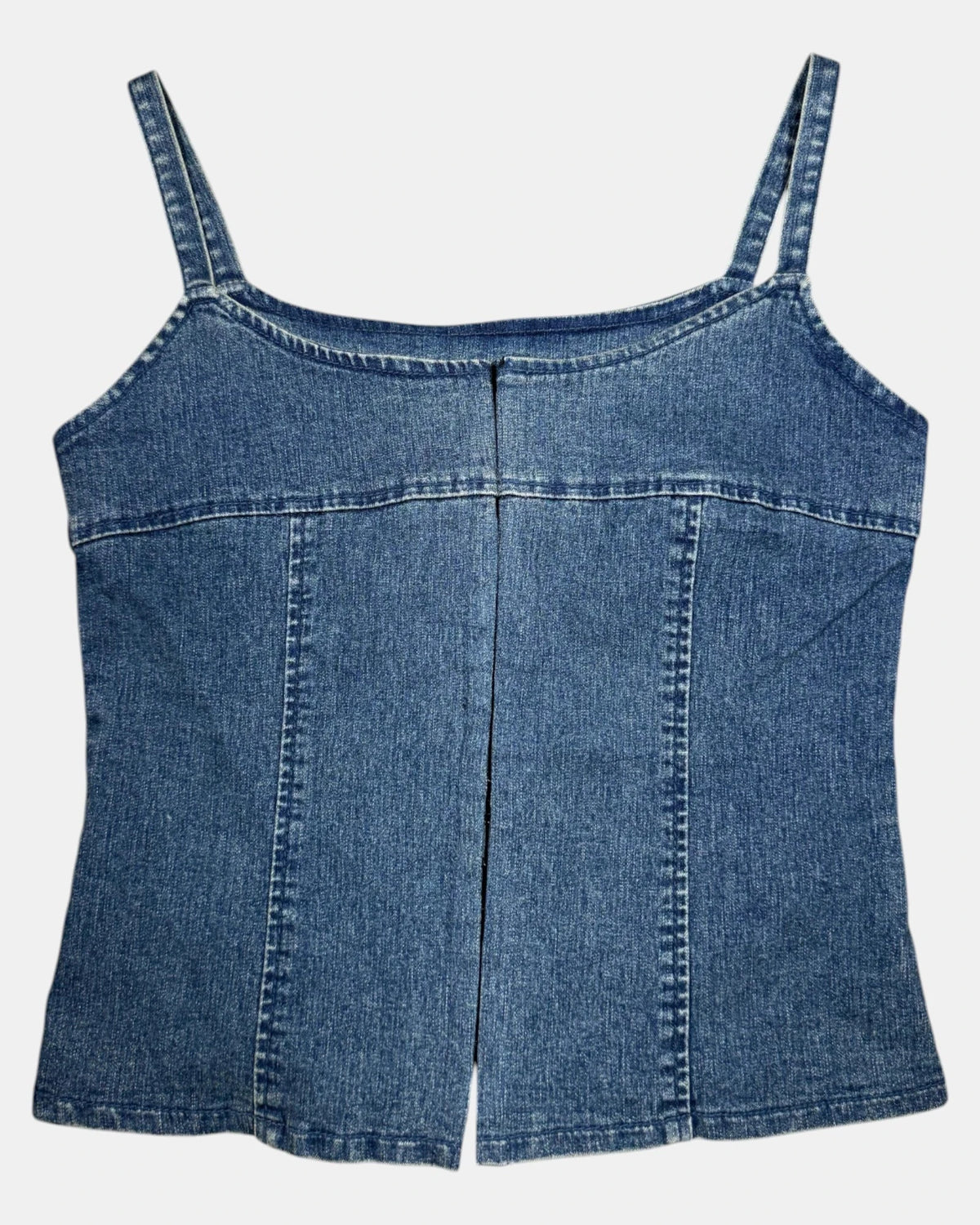 Vintage corsets and tops on a rack