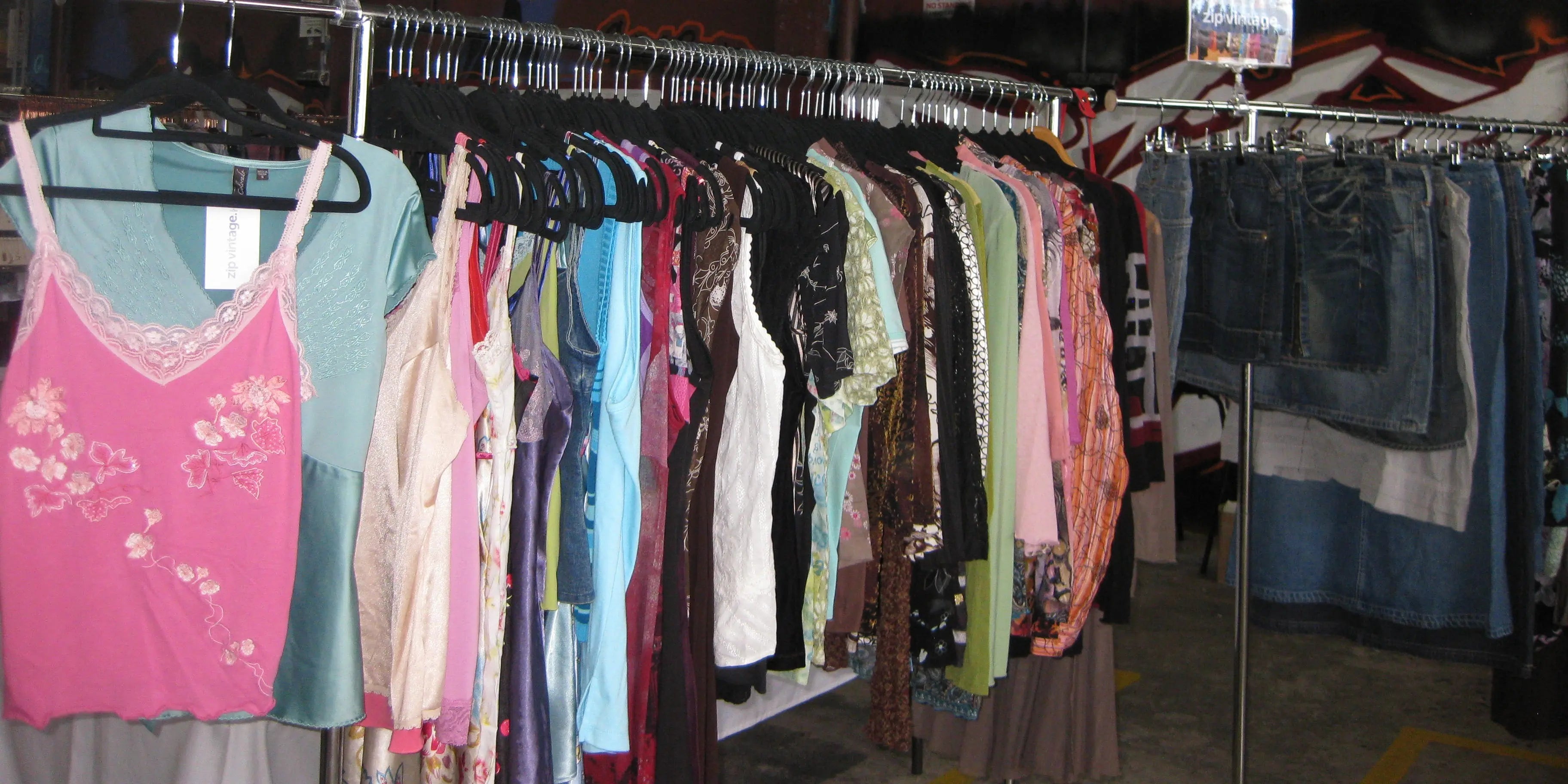 Vintage corsets and tops on a rack