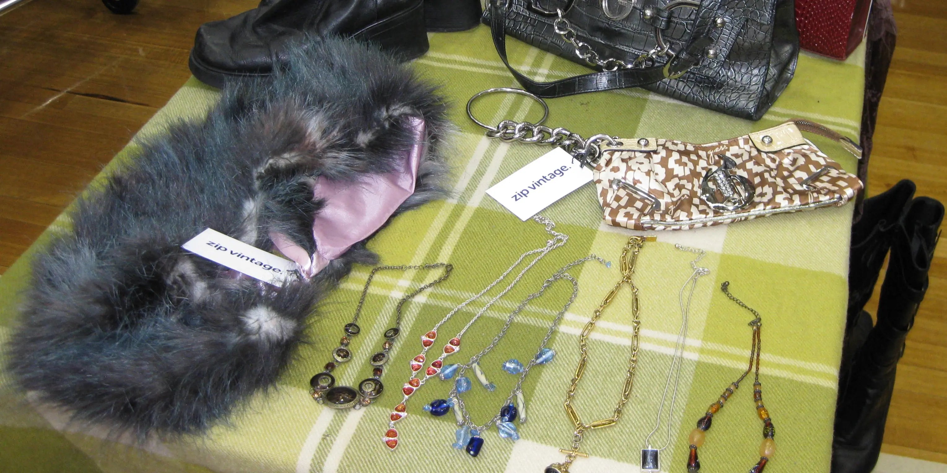 Vintage shawl sitting on display with other accesories