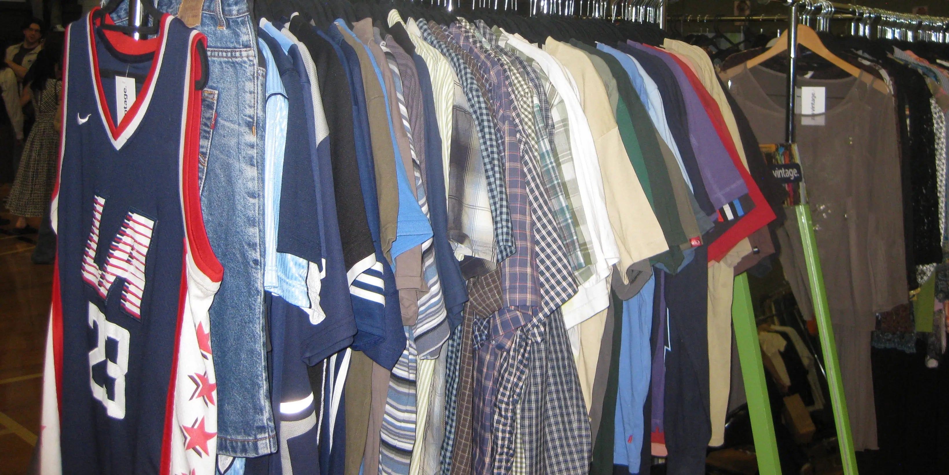 Vintage jerseys and other vintage tops on a rack