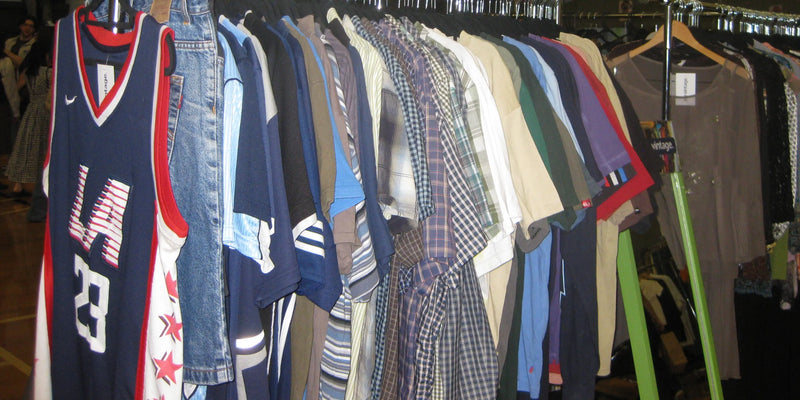 Vintage jerseys and other vintage tops on a rack