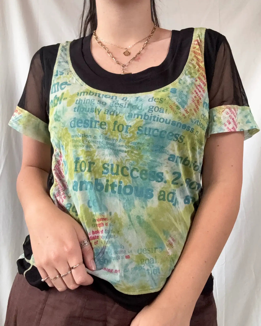 Green and Black Graphic Mesh Top