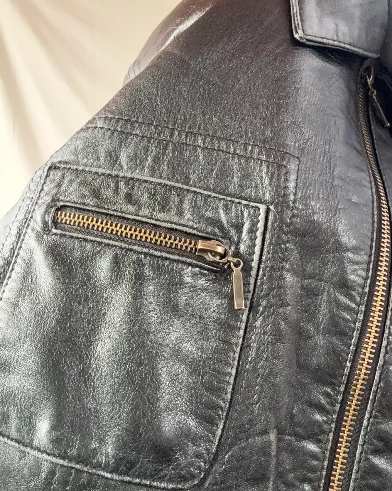 Black Leather Motorcycle Jacket with Multiple Pockets