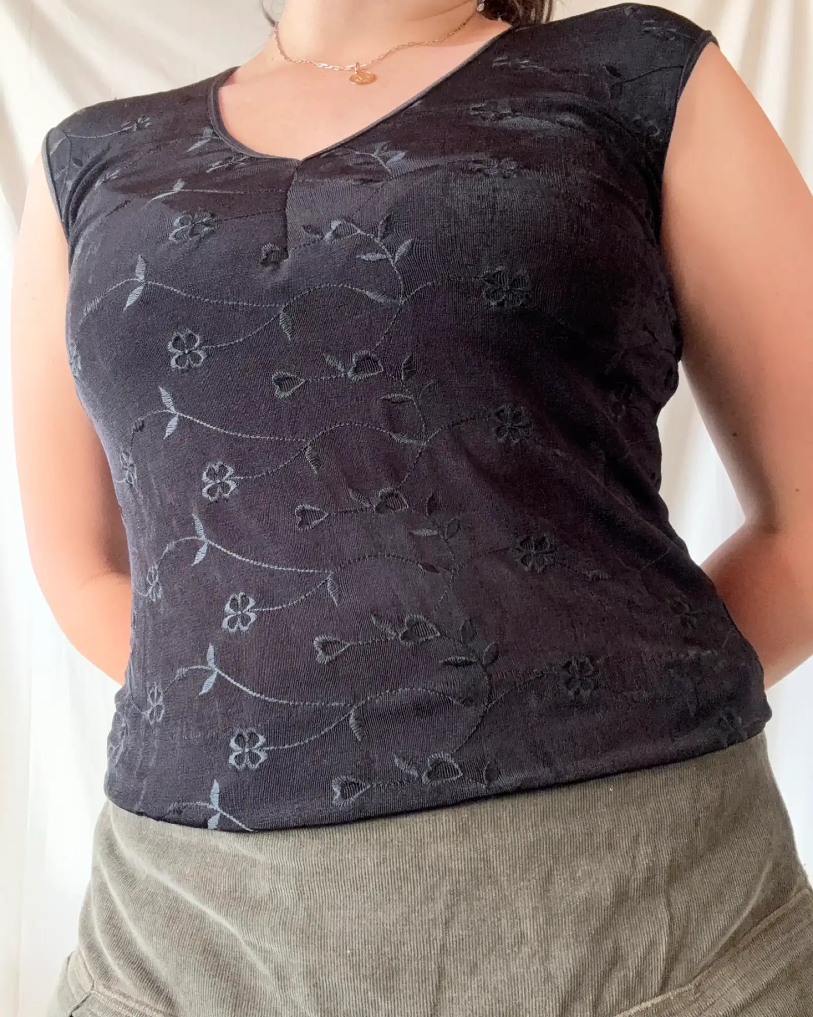Black Top with Floral Details
