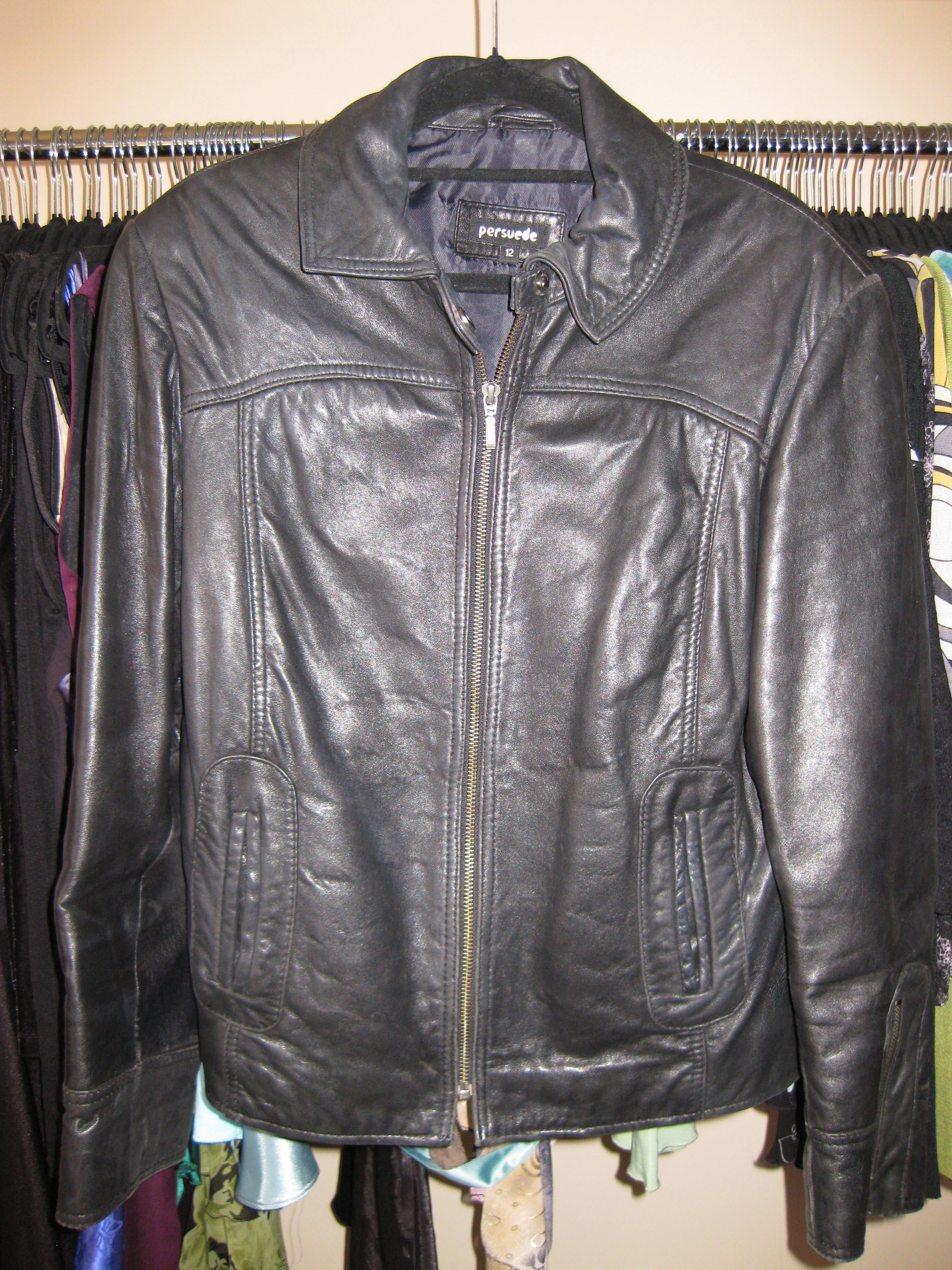 Black leather jacket with arm zipper detail size 12