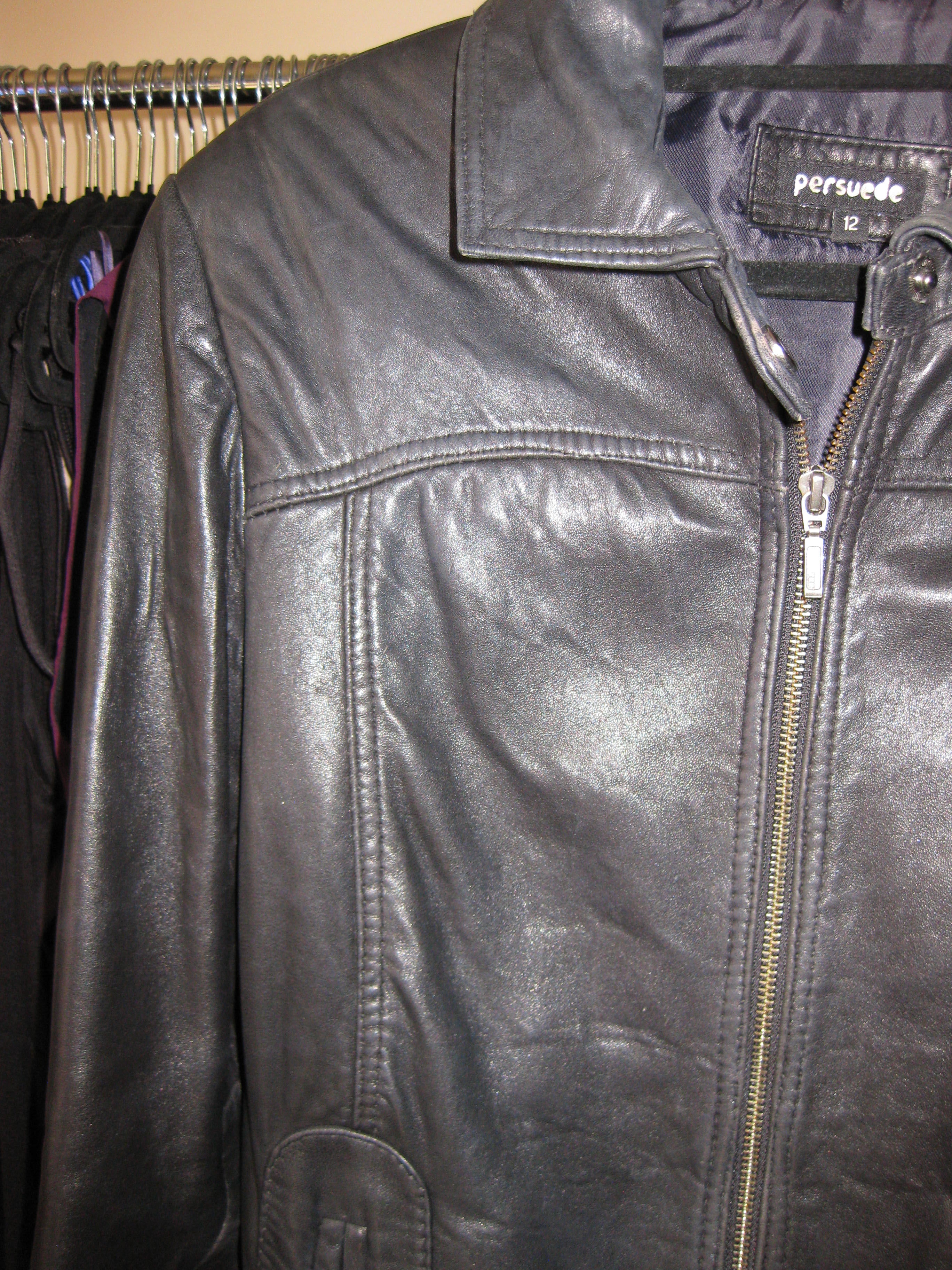 Black biker style leather jacket with arm zippers size 12
