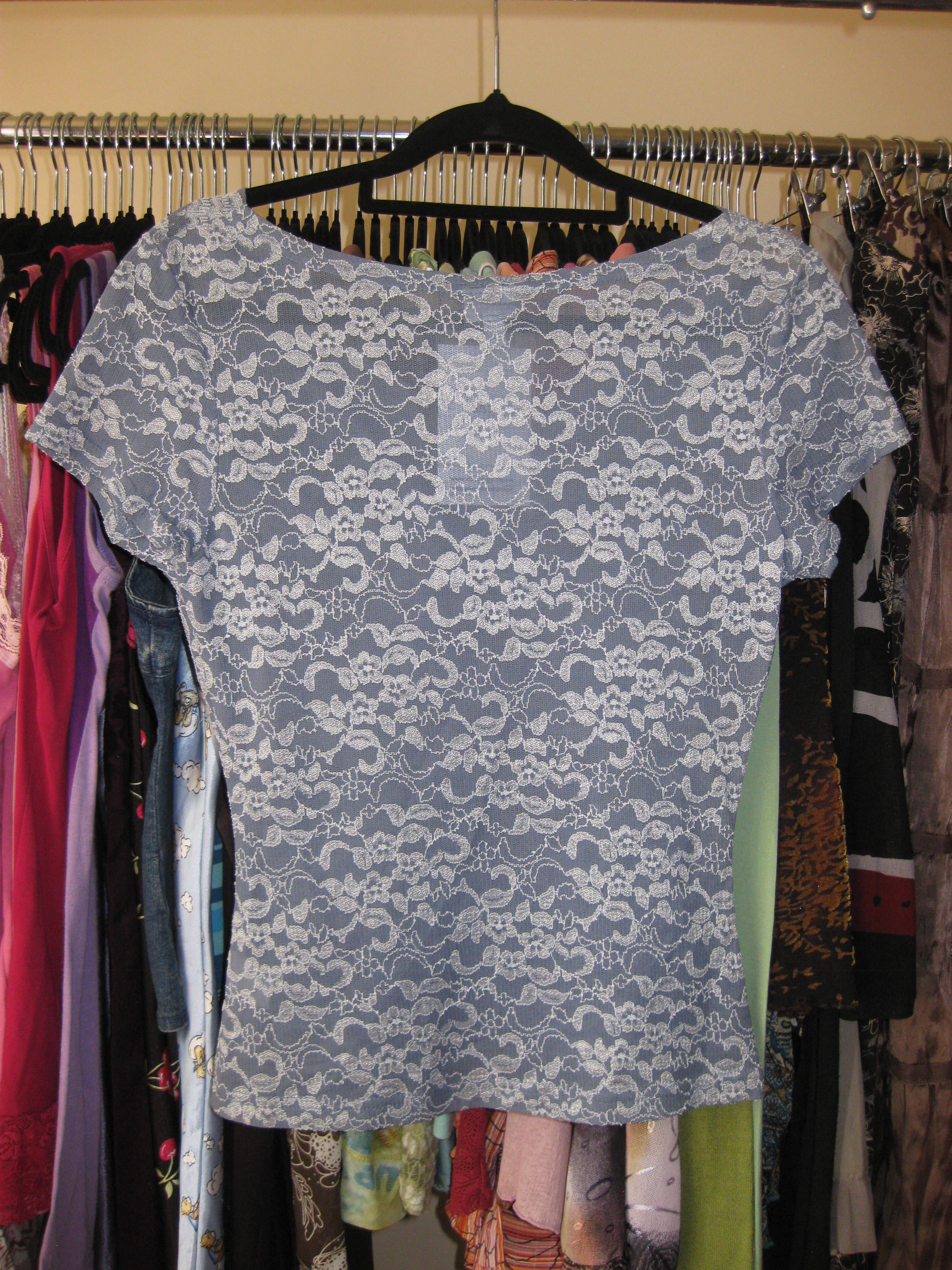 Blue top with lace detailing and wrap style size 10