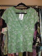 Mesh wrap top in green with blue floral accents size M