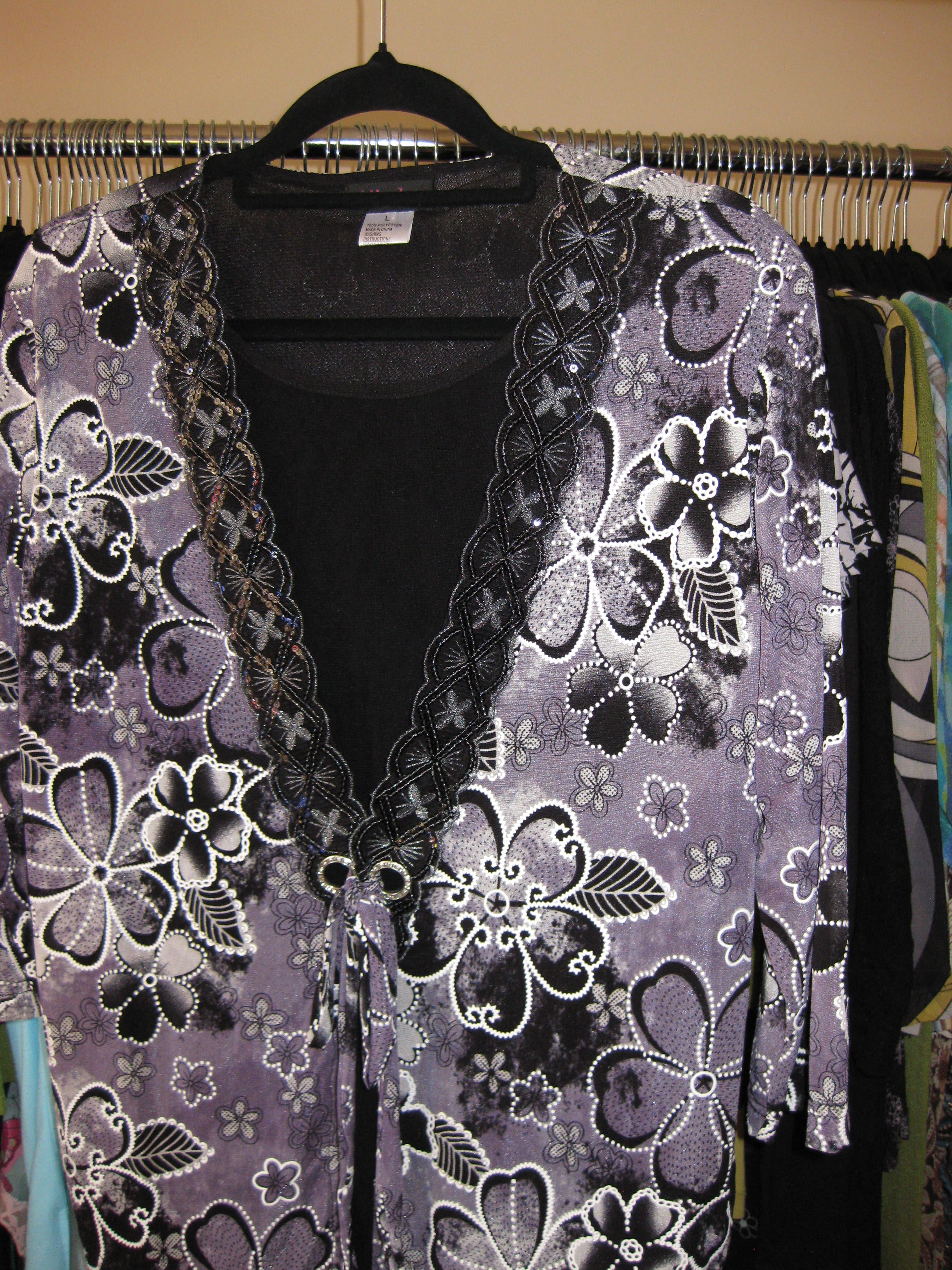 Purple and black tie-front long sleeve top with floral pattern size M