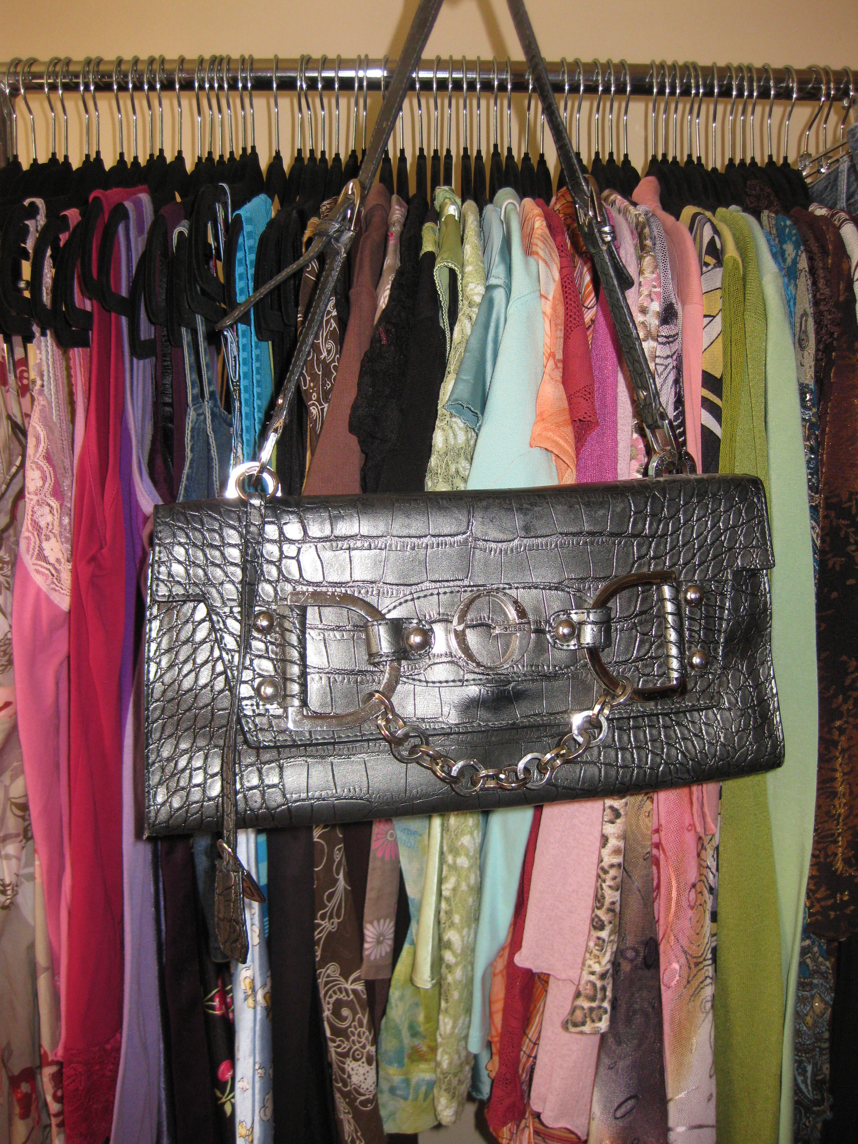 Grey vintage Guess shoulder bag featuring buckle accents